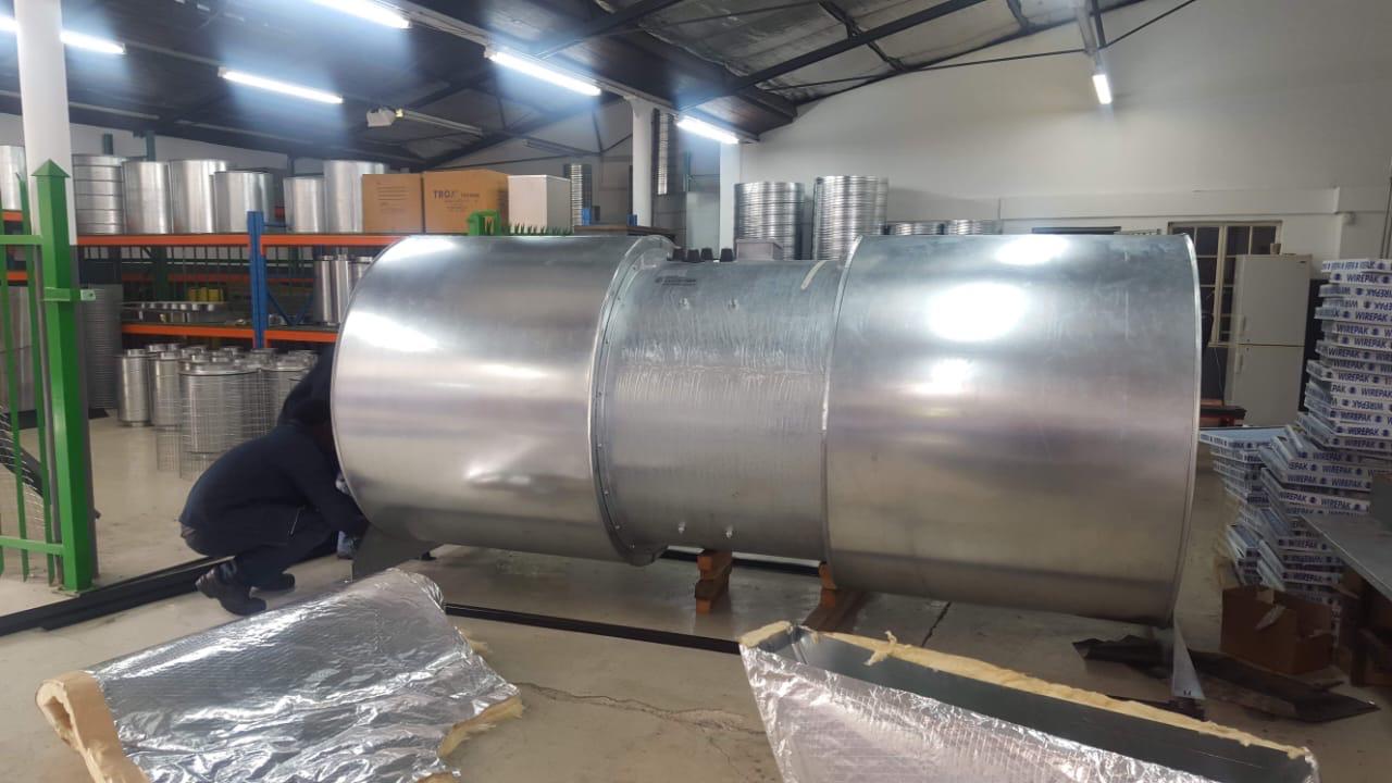 Inline axial fan and attenuators ready for site.