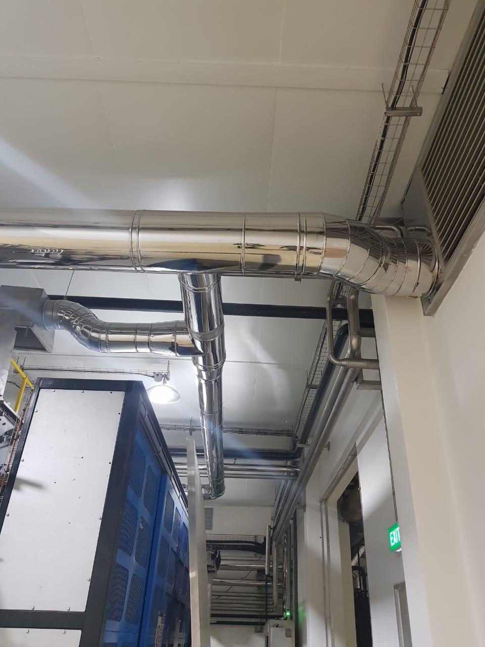 Round ducting run through a ceiling space.