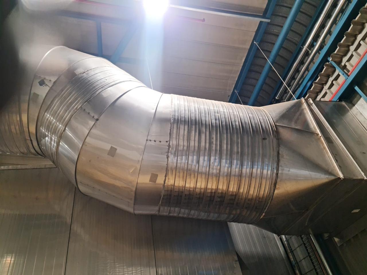 Ducting transitions connecting plenums to spiral duct.